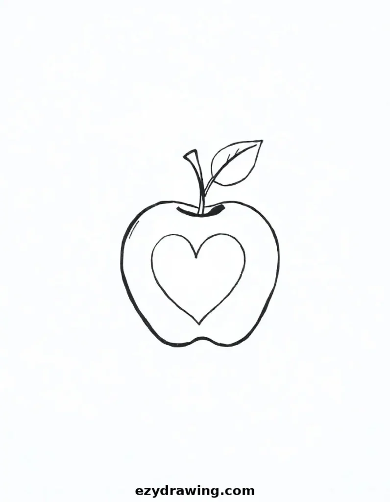 Apple with a heart-shaped seed design, perfect for creative art
